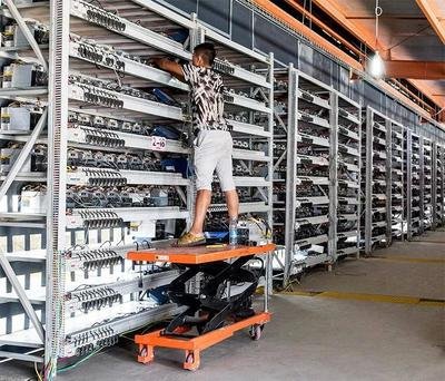 An expansive view of a secure mining farm, illustrating optimal environments for hosting various cryptocurrency operations