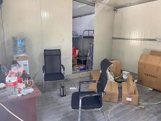 A wide shot of a mining farm, showcasing the scale and infrastructure required for large-scale cryptocurrency mining operations.